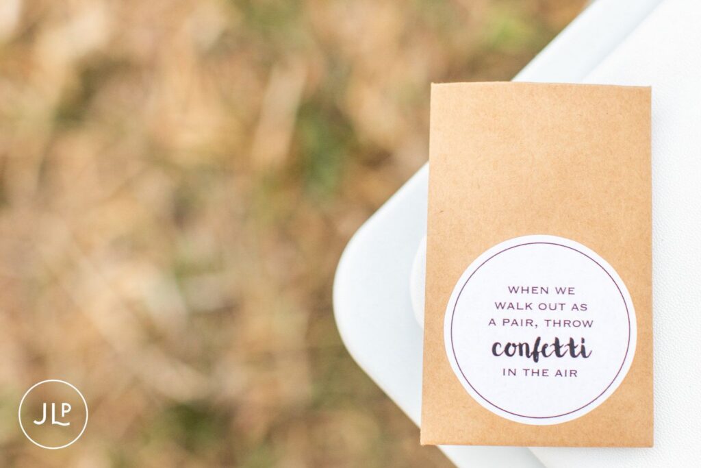 Close-up of a brown kraft paper wedding confetti packet captured by an Africa wedding photographer.