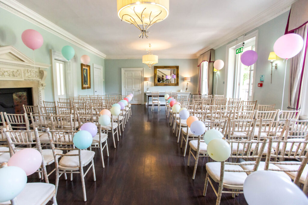 Morden Hall ceremony room with pastel coloured decorations 