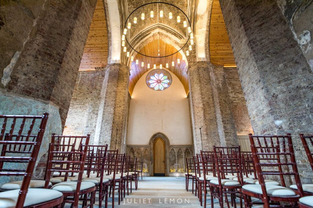 Wide interior view of the empty ceremony space by an Abney Park Chapel wedding photographer.