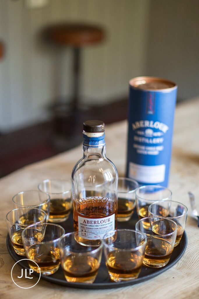 Speyside single malt scotch whisky shots prepared for a Surrey countryside wedding toast.