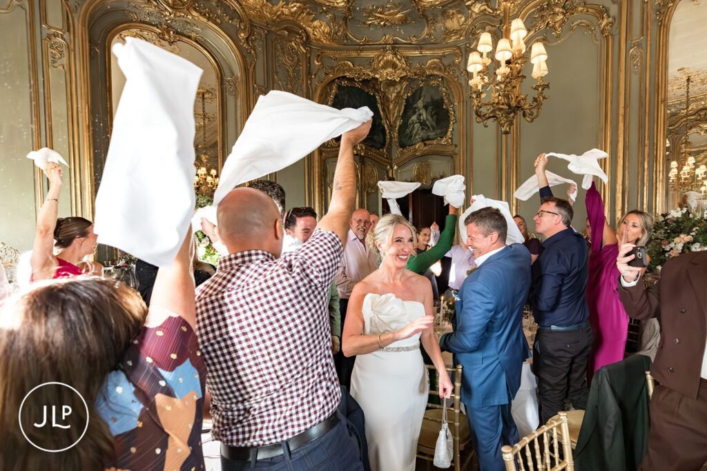 guests celebrating Cliveden House garden wedding