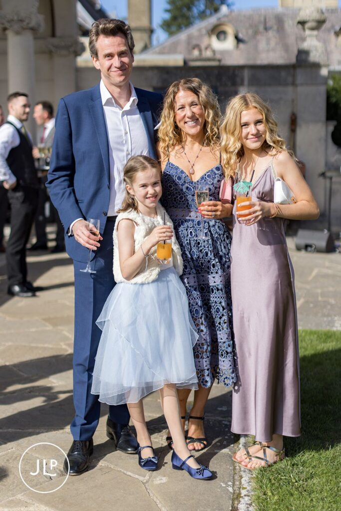 guests celebrating Cliveden House garden wedding