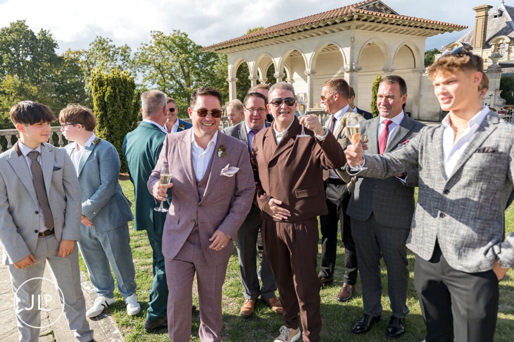 Candid laughter captured by a Cliveden House wedding photographer.