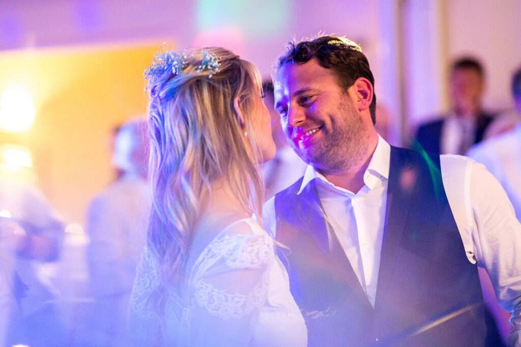 Close-up of Ali and Matty sharing their first dance at a luxury Algarve wedding celebration.