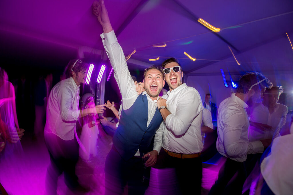 Energetic party moments captured by an Algarve wedding photographer at a luxury destination wedding.
