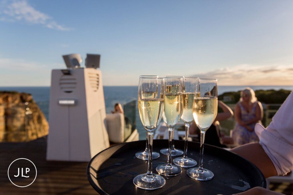 Sparkling wine on a tray at a Sky Bar Carvoeiro wedding welcome event in Portugal.