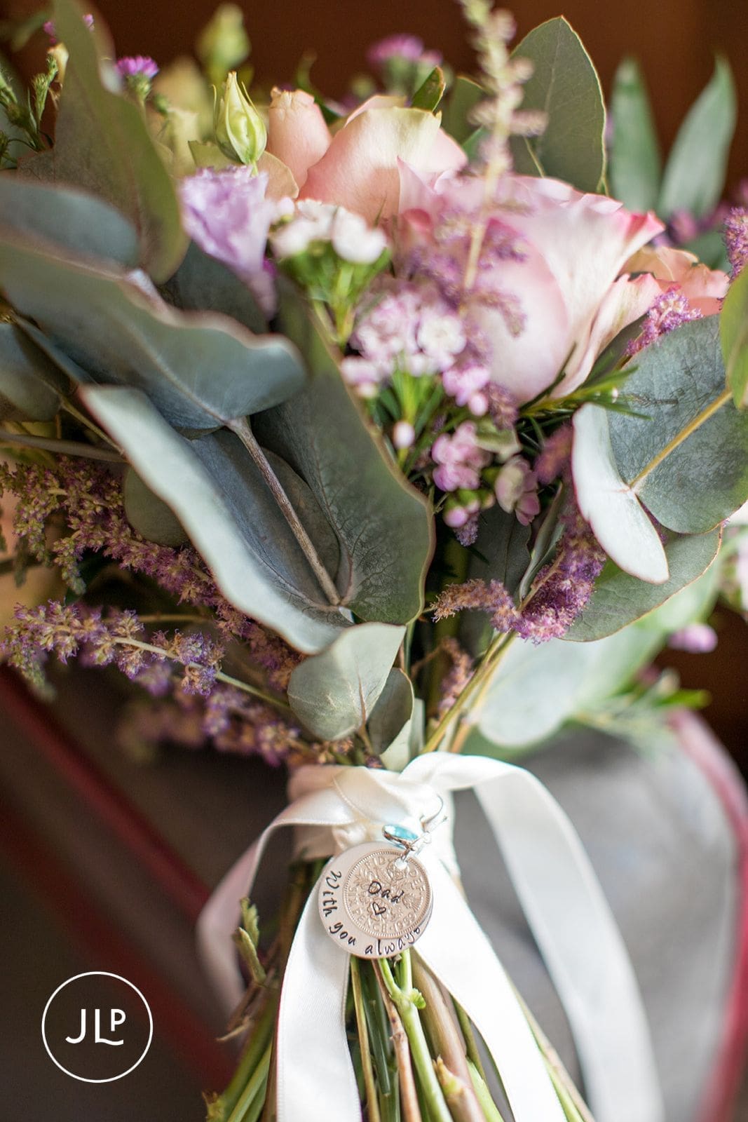 Close-up of wedding bouquet detailing for natural wedding photography at Langshott Manor Surrey wedding.