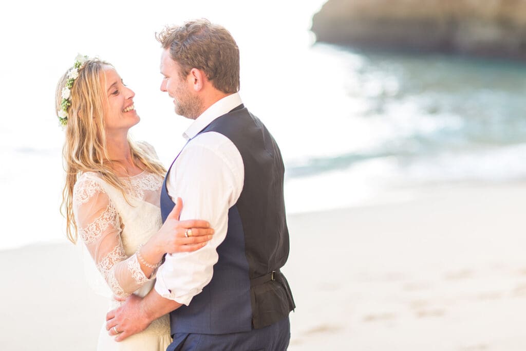 Romantic close-up of Ali and Matty on the beach, captured by a destination wedding photographer.