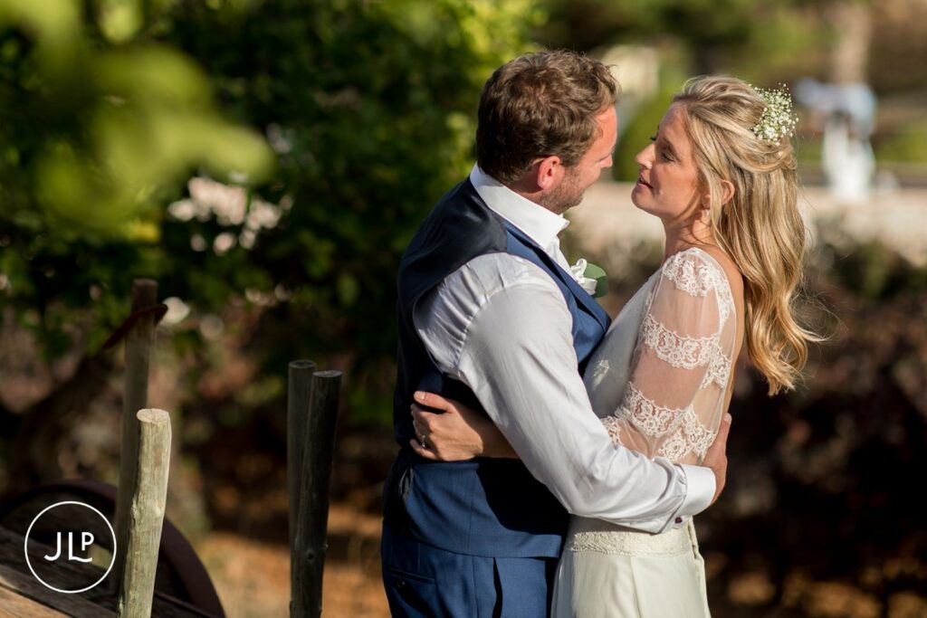Emotional close-up portrait of the couple at sunset, shot by an Algarve luxury wedding photographer.
