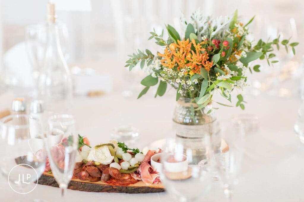 Close-up of a rustic charcuterie sharing board at a luxury Algarve vineyard wedding at Quinta dos Vales.