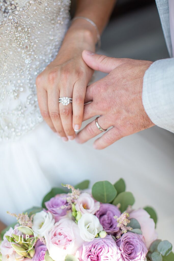 Close-up of wedding rings, captured by a natural wedding photography Gloucestershire specialist.