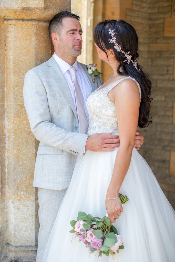 Elegant wedding portrait of the couple captured by a professional Totworth Court wedding photographer.
