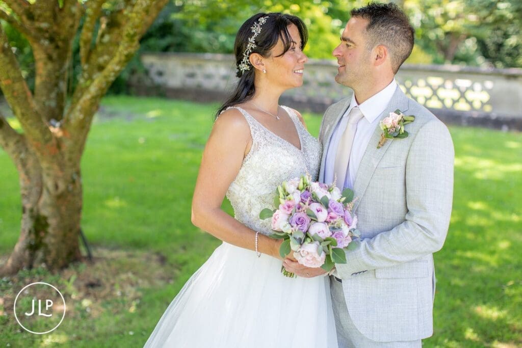 Close-up couple portrait by Tortworth Court wedding photographer.